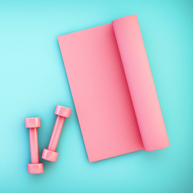 Lisa demonstrates a Pilates routine on a pink yoga mat with a notebook and dumbbell nearby in a studio setting.